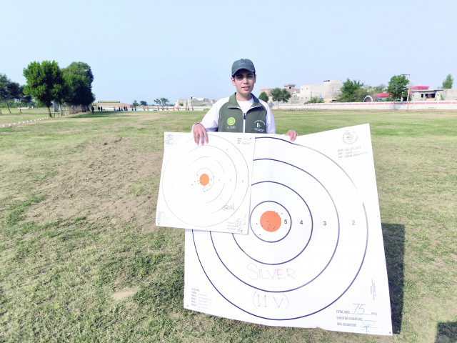 young ahsan waleed shows off the results of his brilliant marksmanship on saturday photo nabil tahir young ahsan waleed shows off the results of his brilliant marksmanship on saturday photo nabil tahir