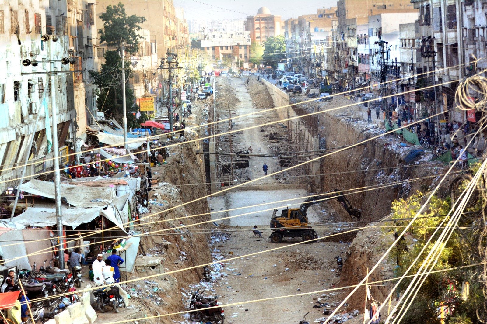 unplanned progress the work on the underpass in the karimabad area of karachi is moving at a slow pace compounding the problems of the local communities photo express