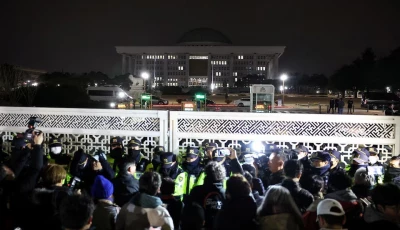 police officers stand guard at the gate of the national assembly after south korean president yoon suk yeol declared martial law in seoul south korea on december 4 2024 photo reuters