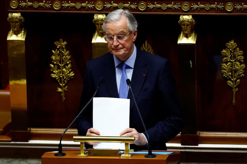 french prime minister michel barnier reacts after he delivered a speech during a debate on two motions of no confidence against the french government on december 4 2024 photo reuters