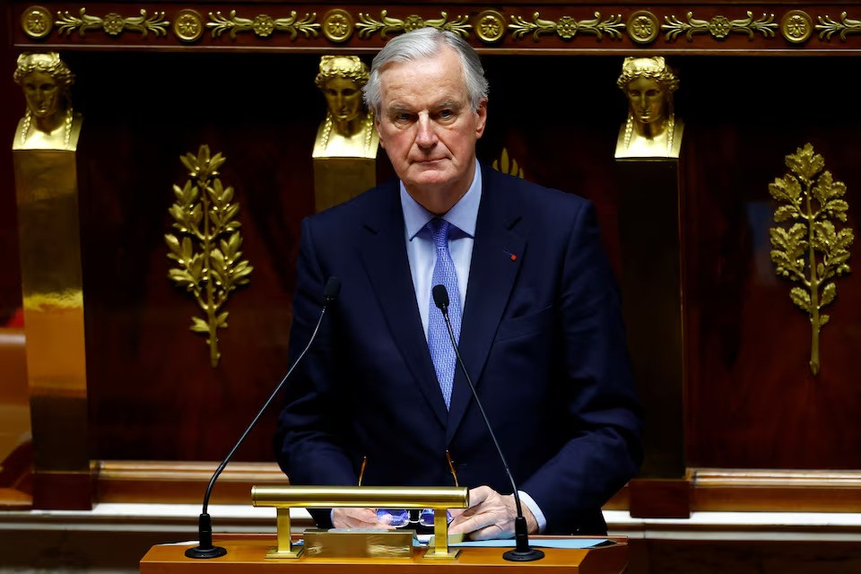 french prime minister michel barnier arrives to deliver a speech during a debate on two motions of no confidence against the french government on december 4 2024 photo reuters