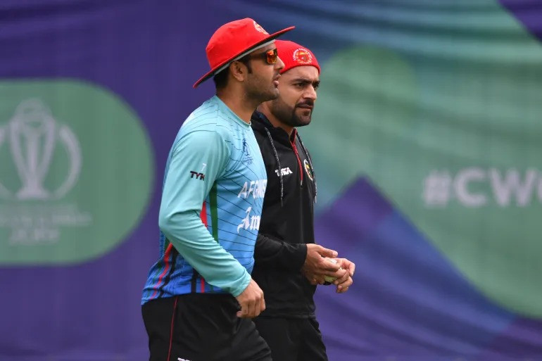 mohammad nabi and rashid khan are among the world s top all rounders and the most popular cricketers in afghanistan photo afp