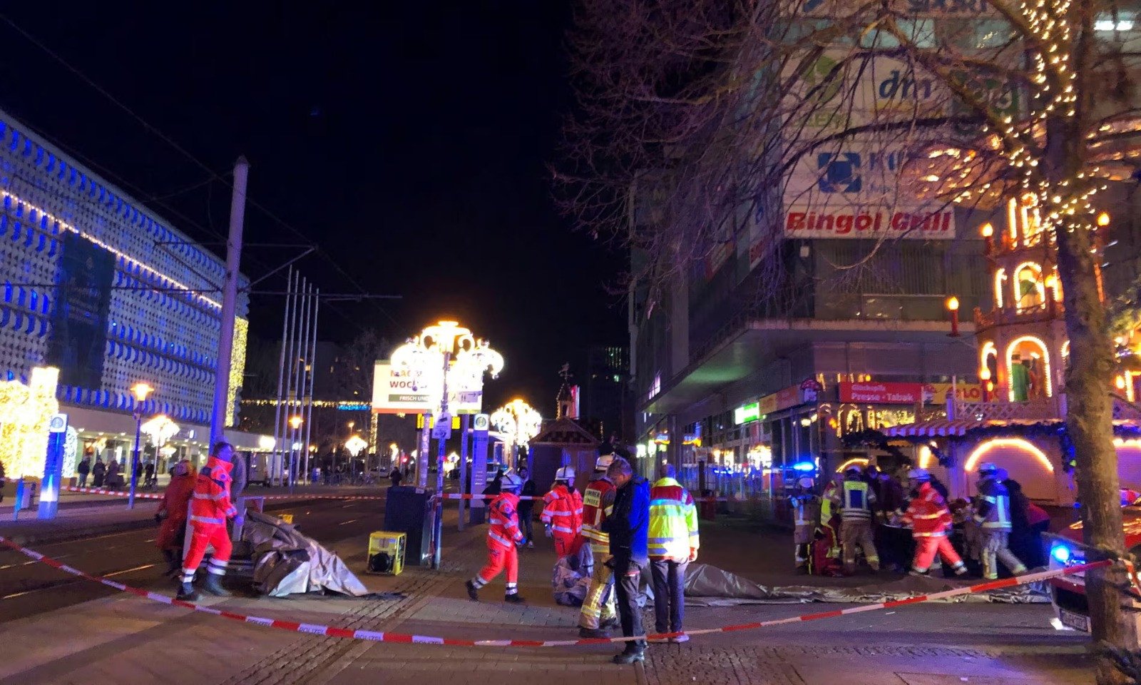 emergency services attend an incident at the christmas market in magdeburg on friday photo ap