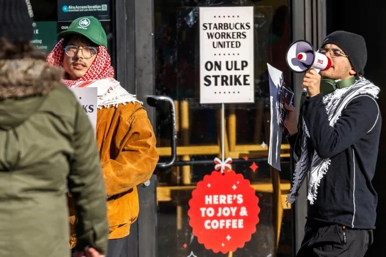 workers picket in front of a starbucks in the brooklyn borough of new york us december 23 2024 photo reuters