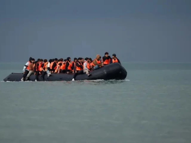 people on an inflatable dinghy attempt to cross the english channel to reach europe photo reuters people on an inflatable dinghy attempt to cross the english channel to reach europe photo reuters