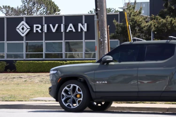 rivian shares surge 23 after beating production targets