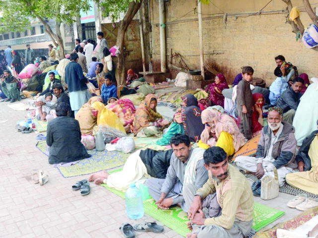 attendants of patients from outside the city camp in an open space at the civil hospital due to lack of free shelters photo jalal qureshi express attendants of patients from outside the city camp in an open space at the civil hospital due to lack of free shelters photo jalal qureshi express