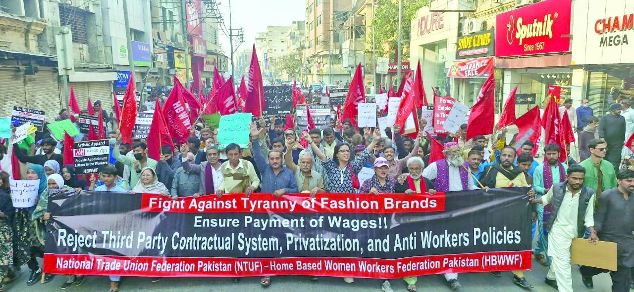 massive workers rally in karachi protests against exploitation and unfair labour practices the protesters carrying red flags banners and placards highlighted their demands for fair wages safe working conditions and an end to contract labour systems photo express