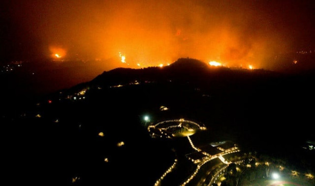 a wildfire approaches greece s olympia the birthplace of the olympics as a heatwave sparks blazes across southeastern europe photo afp a wildfire approaches greece s olympia the birthplace of the olympics as a heatwave sparks blazes across southeastern europe photo afp