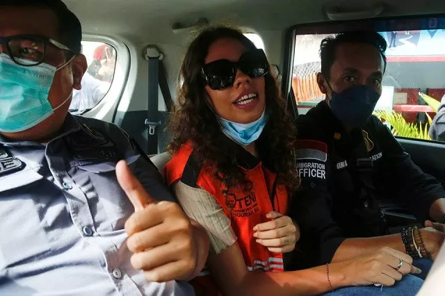 heather mack an american woman jailed in 2015 with her boyfriend after being found guilty for playing a role in murdering her mother and stuffing the remains in a suitcase is seen inside an immigration car after being released from kerobokan prison in denpasar bali indonesia october 29 2021 photo reuters heather mack an american woman jailed in 2015 with her boyfriend after being found guilty for playing a role in murdering her mother and stuffing the remains in a suitcase is seen inside an immigration car after being released from kerobokan prison in denpasar bali indonesia october 29 2021 photo reuters