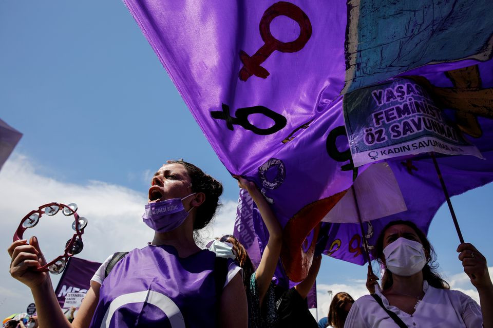 activists shout slogans hold banners and wave flags during a protest against turkey s withdrawal from the istanbul convention an international accord designed to protect women in istanbul turkey june 19 2021 photo reuters file