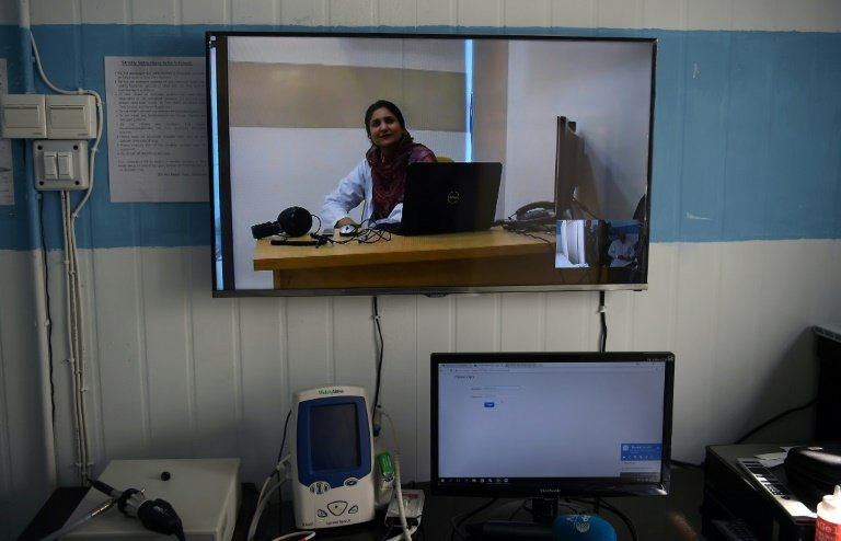 pakistani doctor nadia rasheed speaks during an interview via skype at a government run online treatment centre file photo afp