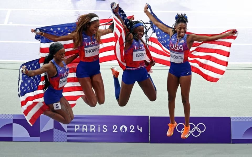 gabrielle thomas sha carri richardson twanisha terry and melissa jefferson of united states celebrate winning women s 4 x 100m relay final at paris 2024 olympics in stade de france saint denis france on august 09 2024 photo reuters