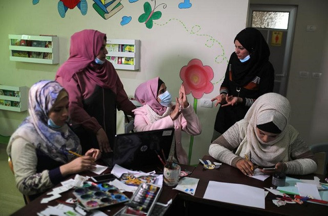 hearing impaired palestinian women attend a lesson as they learn to make animation films in the central gaza strip march 18 2021 picture taken march 18 2021 photo reuters