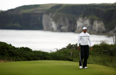 woods resumes chase for record win