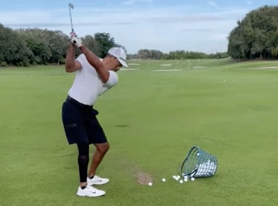 video of woods hitting balls excites golf world