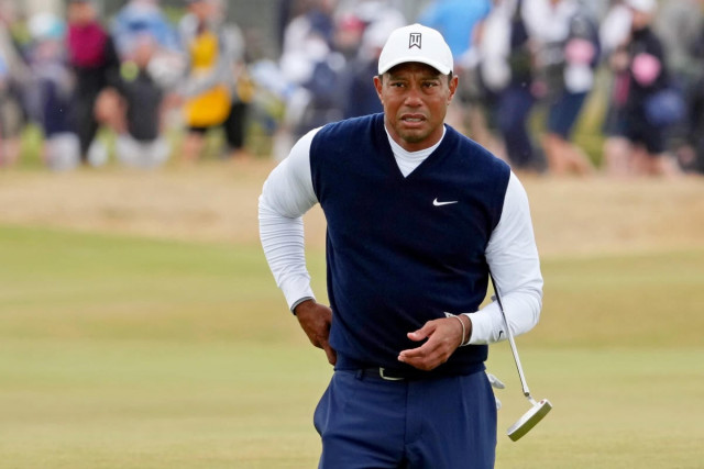 limping tiger slumps to six over at british open limping tiger slumps to six over at british open