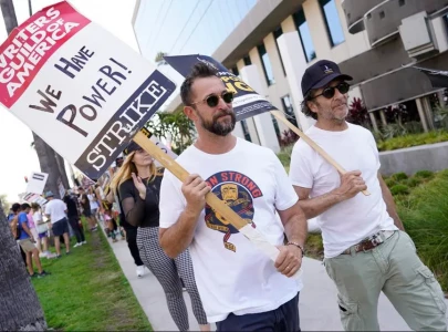 hollywood writers strike ends with pay raises protection over ai and more