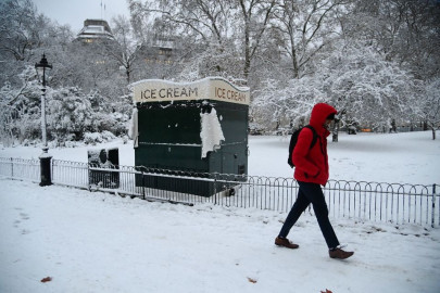heavy snow in britain disrupts travel national grid readies two coal plants