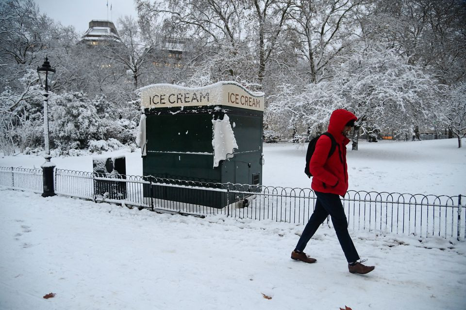a person walks through the snow as cold weather continues in london britain december 12 2022 reuters