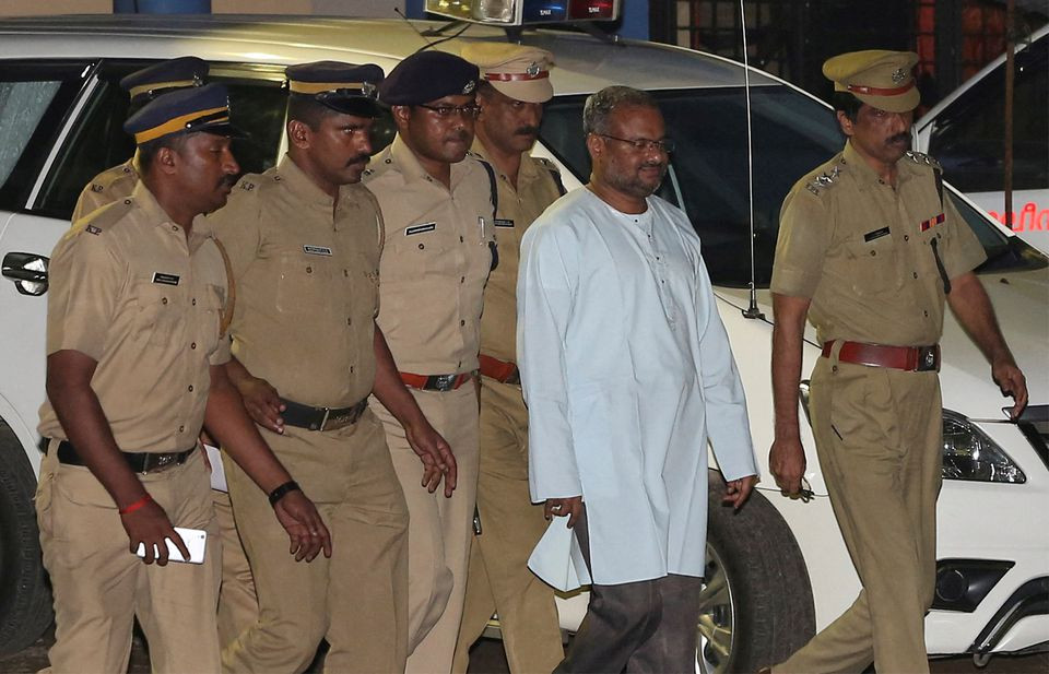 bishop franco mulakkal 2nd r accused of raping a nun is escorted by police outside a crime branch office on the outskirts of kochi in the southern state of kerala india september 21 2018 reuters