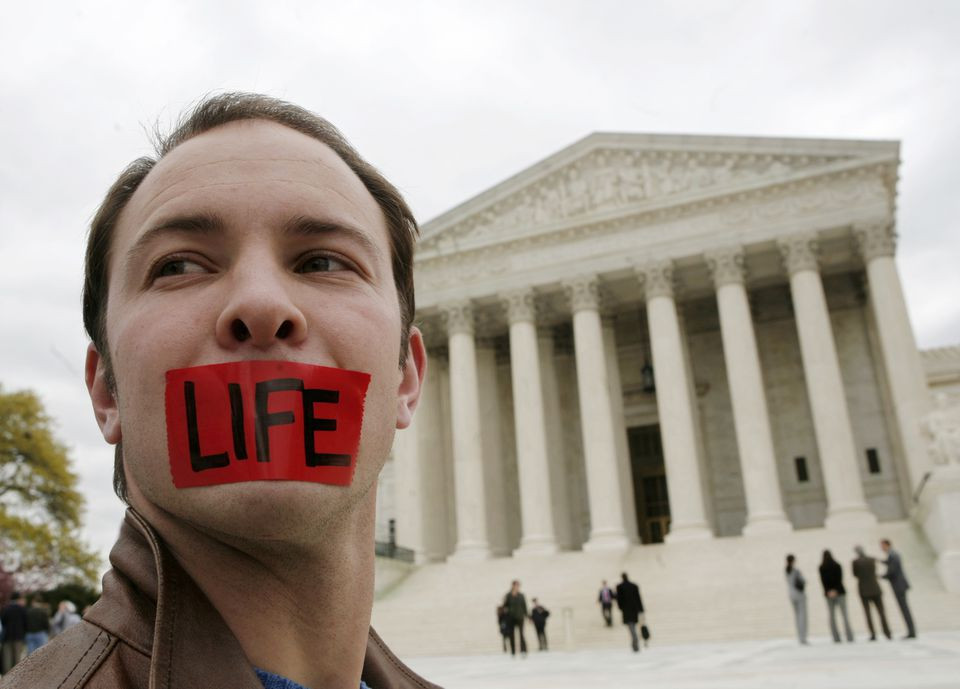 pro life supporter josh alcorn demonstrates in front of the supreme court after the court upheld the first nationwide ban on a specific abortion procedure in washington april 18 2007 reuters