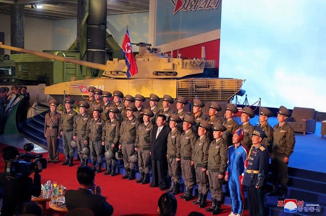 north korea s leader kim jong un takes pictures with military personnel at the defence development exhibition in pyongyang north korea in this undated photo released on october 12 2021 by north korea s korean central news agency kcna photo reuters north korea s leader kim jong un takes pictures with military personnel at the defence development exhibition in pyongyang north korea in this undated photo released on october 12 2021 by north korea s korean central news agency kcna photo reuters