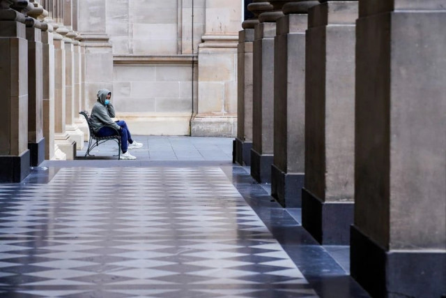 a lone man wearing a protective face mask sits at an unusually quiet state library on the first day of a lockdown as the state of victoria looks to curb the spread of a coronavirus disease covid 19 outbreak in melbourne australia july 16 2021 photo reuters a lone man wearing a protective face mask sits at an unusually quiet state library on the first day of a lockdown as the state of victoria looks to curb the spread of a coronavirus disease covid 19 outbreak in melbourne australia july 16 2021 photo reuters