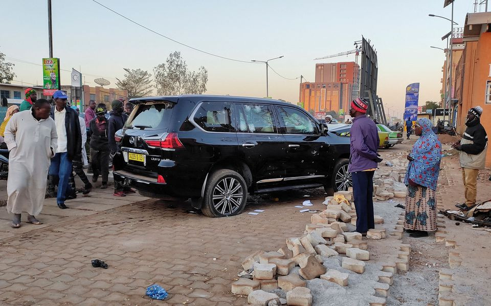 bullet holes are seen in a car that belong to presidency following heavy gunfire near the president roch kabore residence in ouagadougou burkina faso january 24 2022 photo reuters