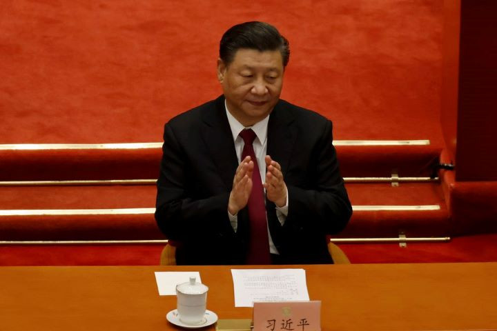 chinese president xi jinping applauds at the closing session of the chinese people s political consultative conference cppcc at the great hall of the people in beijing china march 10 2021 reuters