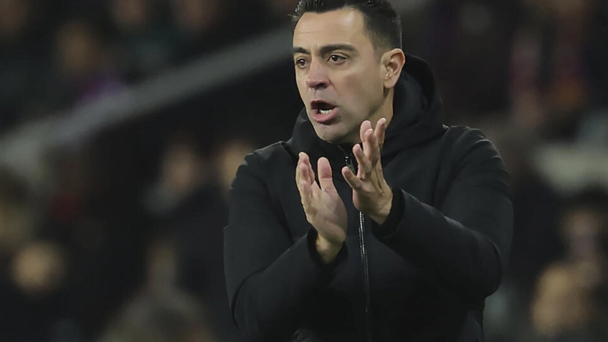 barcelona coach xavi hernandez hit out at real madrid who sit 10 points clear of his team in la liga photo afp