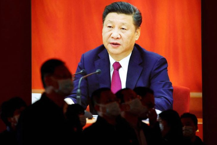 visitors stand in front of an image of chinese president xi jinping at an exhibition titled forging ahead in the new era during an organised media tour ahead of the 20th national congress of the communist party of china in beijing china october 12 2022 photo reuters file