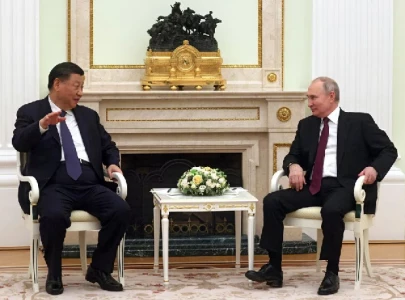 xi lauds robust growth of china russia ties in meeting with putin