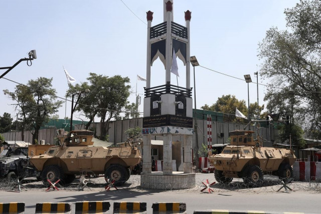 armored vehicles are seen in front of the presidential palace in kabul afghanistan september 4 2021 wana west asia news agency via reuters armored vehicles are seen in front of the presidential palace in kabul afghanistan september 4 2021 wana west asia news agency via reuters