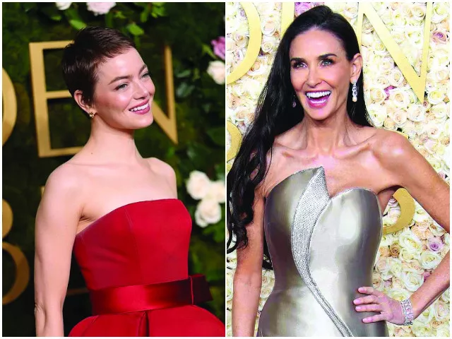 moore flaunted a champagne coloured gown while stone debuted a nutmeg pixie cut photos file moore flaunted a champagne coloured gown while stone debuted a nutmeg pixie cut photos file