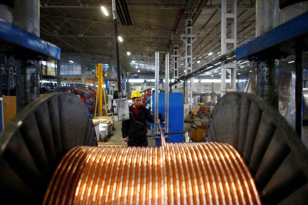 a worker checks copper cables being produced at a factory in the central anatolian city of kayseri february 12 2015 photo reuters