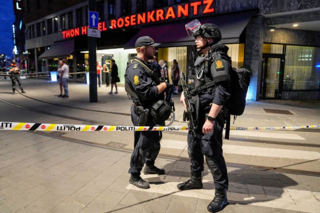 security forces stand at the site where several people were injured during a shooting outside the london pub in central oslo norway june 25 2022 reuters security forces stand at the site where several people were injured during a shooting outside the london pub in central oslo norway june 25 2022 reuters