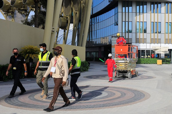 workers walk at the expo 2020 site ahead of the opening ceremony in dubai united arab emirates september 30 2021 photo reuters