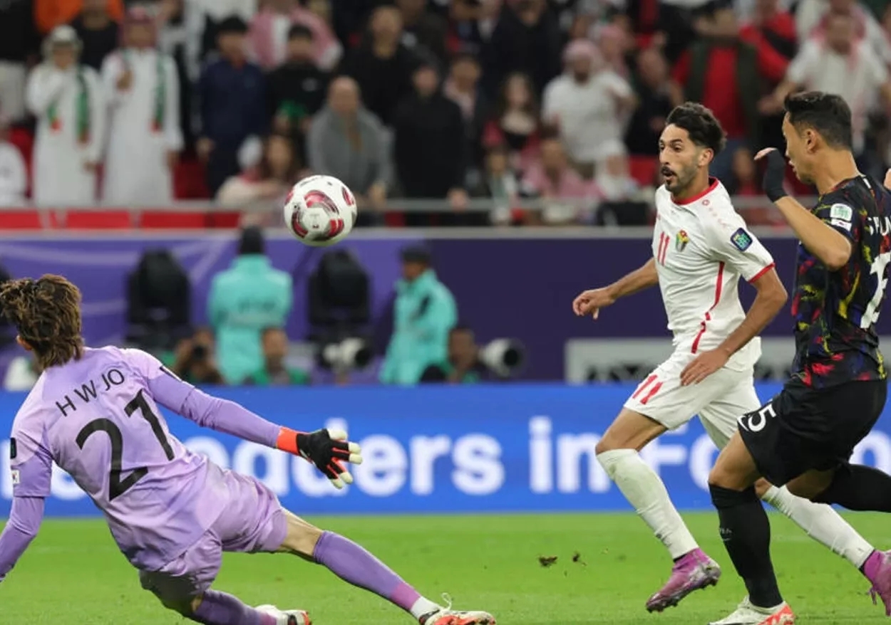 yazan al naimat scores for jordan against south korea photo afp yazan al naimat scores for jordan against south korea photo afp
