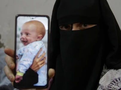 gaza war separates parents from their new born baby