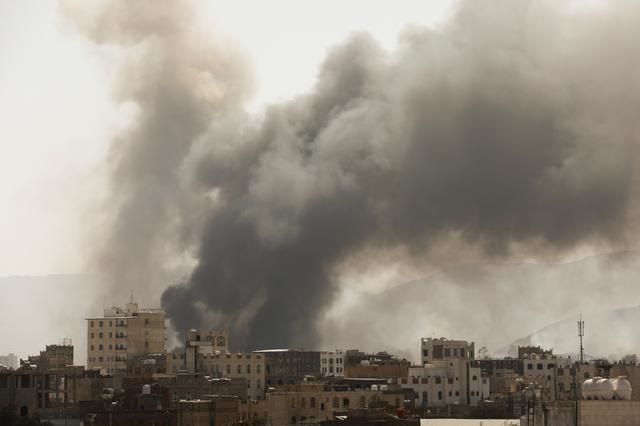 smoke billows from the site of saudi led air strikes in sanaa yemen march 7 2021 photo reuters