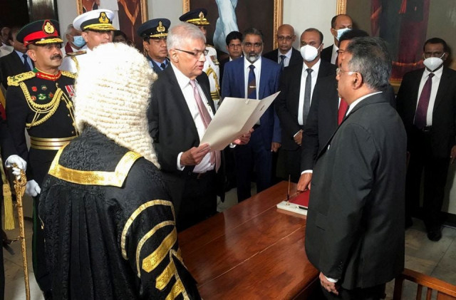 ranil wickremesinghe sworn in as the new president of sri lanka by the chief justice jayantha jayasuriya at the parliament amid the country s economic crisis in colombo sri lanka july 21 2022 reuters ranil wickremesinghe sworn in as the new president of sri lanka by the chief justice jayantha jayasuriya at the parliament amid the country s economic crisis in colombo sri lanka july 21 2022 reuters