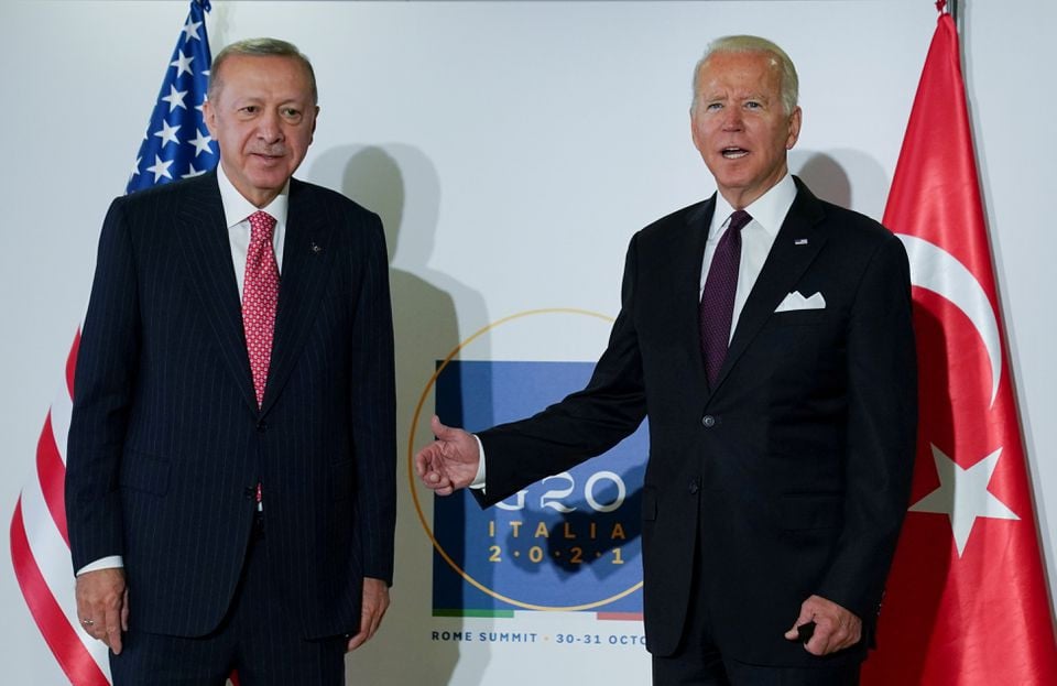 us president joe biden and turkey s president tayyip erdogan pose for a photo as they attend a bilateral meeting on the sidelines of the g20 leaders summit in rome italy october 31 2021 reuters