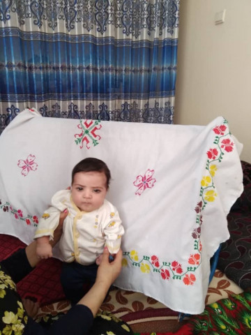 sohail ahmadi around two months old is seen in this handout picture taken august 2021 in kabul afghanistan sohail s parents mirza ali and his wife suraya handed him over the fence to a us soldier on august 19 2021 in the chaos following the us troop withdrawal and hasty evacuation at the kabul airport but by the time the family got to the other side of the fence the baby was no where to be found courtesy of the ahmadi family handout via reuters sohail ahmadi around two months old is seen in this handout picture taken august 2021 in kabul afghanistan sohail s parents mirza ali and his wife suraya handed him over the fence to a us soldier on august 19 2021 in the chaos following the us troop withdrawal and hasty evacuation at the kabul airport but by the time the family got to the other side of the fence the baby was no where to be found courtesy of the ahmadi family handout via reuters