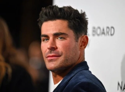 zac efron makes stylish return to public eye at amfar gala after hospitalization