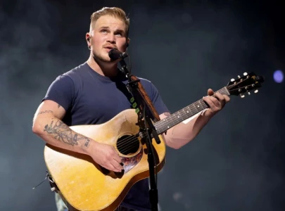 zach bryan issues warning to fans after object thrown at guitarist during tacoma dome concert zach bryan issues warning to fans after object thrown at guitarist during tacoma dome concert