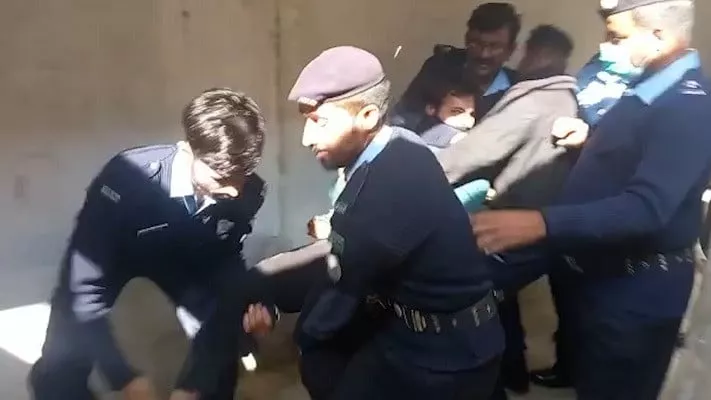 police officers try to hold zahir jaffer as he throws himself about on being escorted out of the court on judge ata rabbani s orders photo express file police officers try to hold zahir jaffer as he throws himself about on being escorted out of the court on judge ata rabbani s orders photo express file