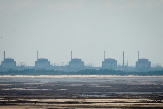 zaporizhzhia nuclear power plant from the bank of kakhovka reservoir near the town of nikopol ukraine june 16 2023 photo reuters zaporizhzhia nuclear power plant from the bank of kakhovka reservoir near the town of nikopol ukraine june 16 2023 photo reuters