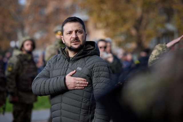 ukraine s president volodymyr zelenskiy sings the national anthem during his visit in kherson ukraine november 14 2022 photo reuters