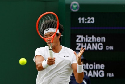 history maker zhang keen for more wimbledon flag bearing duty